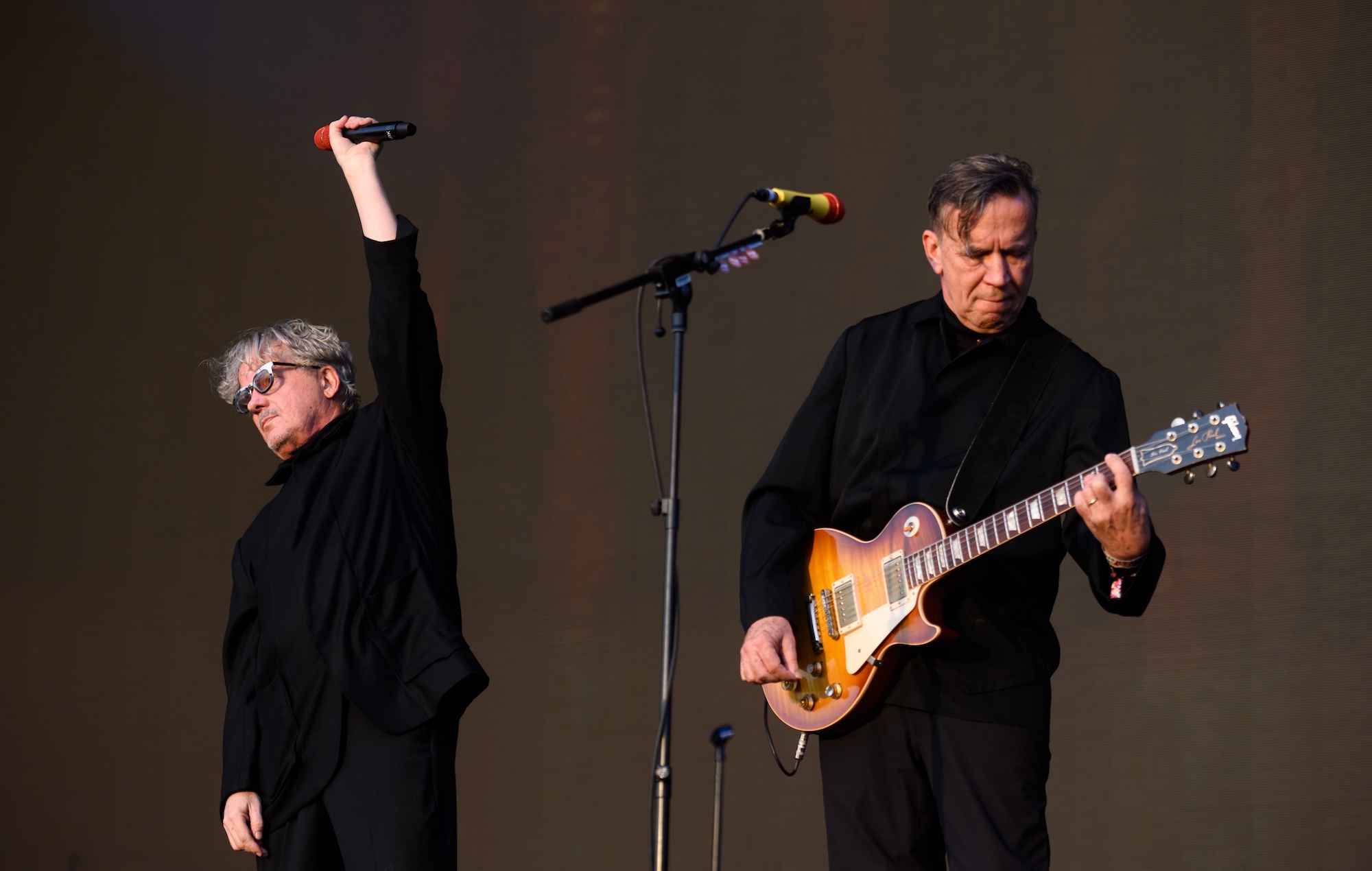 Mark and Bob Mothersbaugh of Devo performing